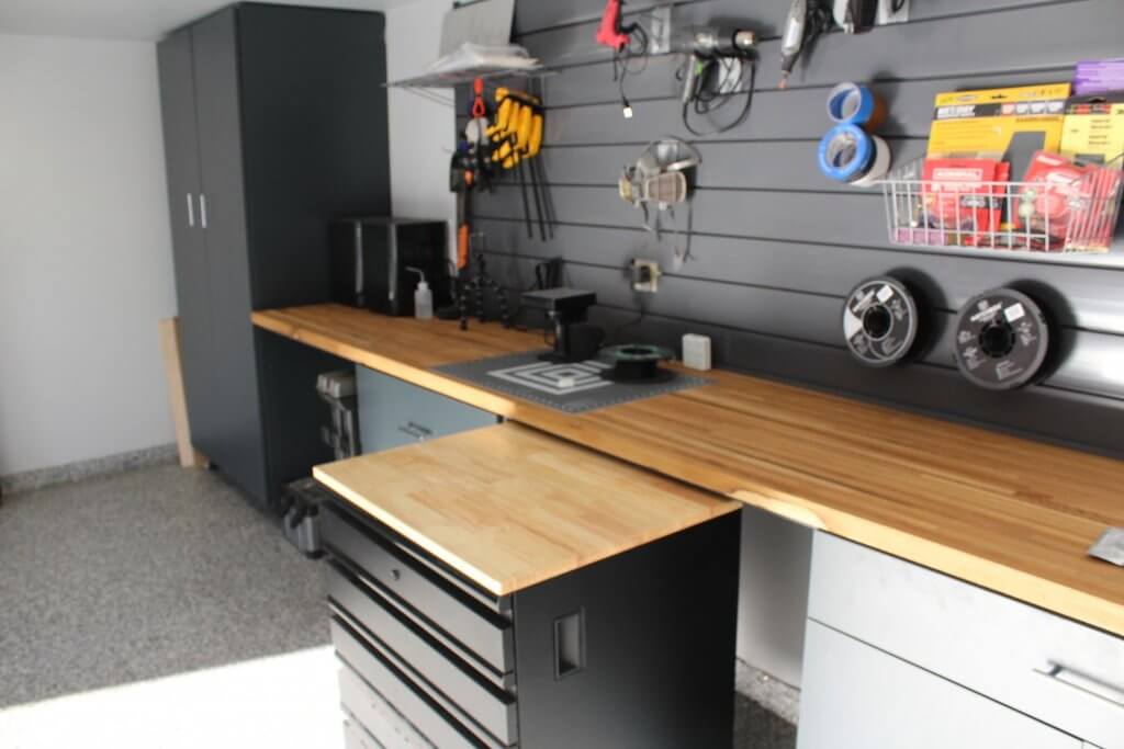 5-Drawer Husky tool chest rolled out of position on casters as a mobile workbench with the rest of the fully remodeled shop and makerspace shown in the background.